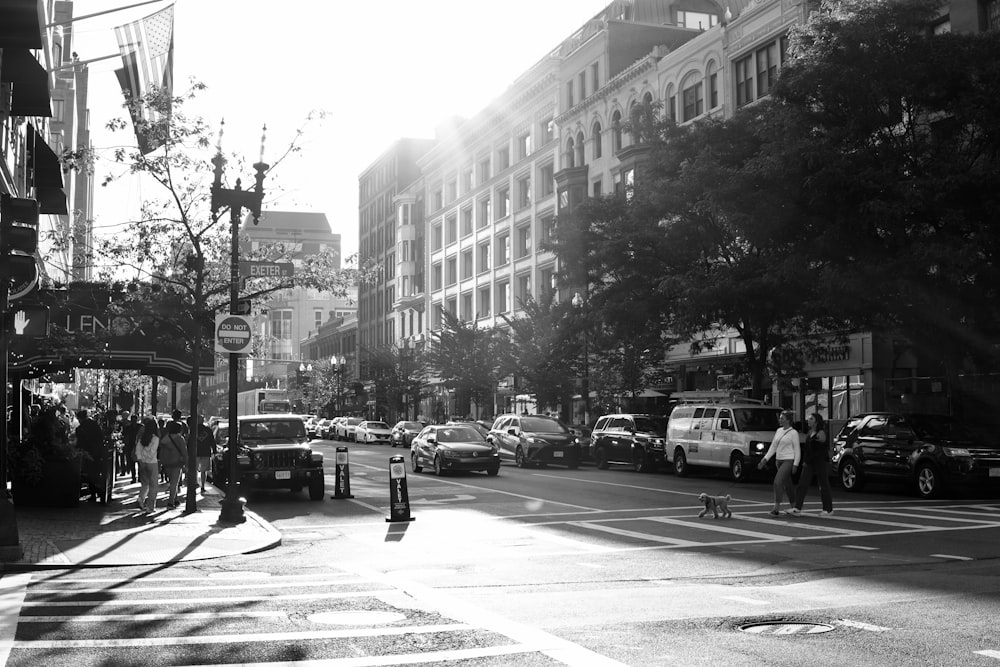 a street with cars and people