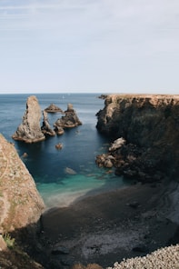 Rock formations and clear blue sea at Los Cabos coastline.