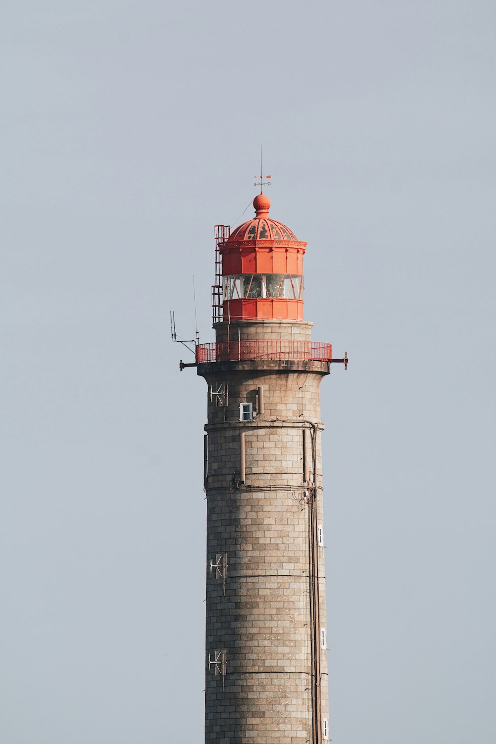a tall tower with a red top