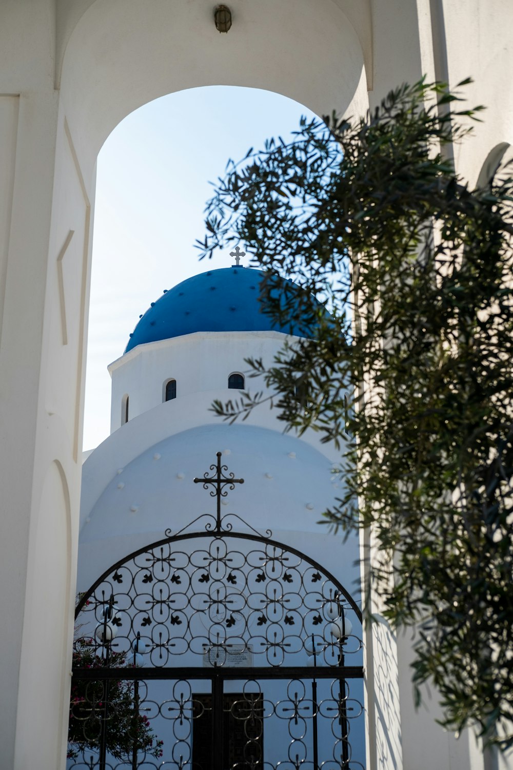 a white building with a blue dome