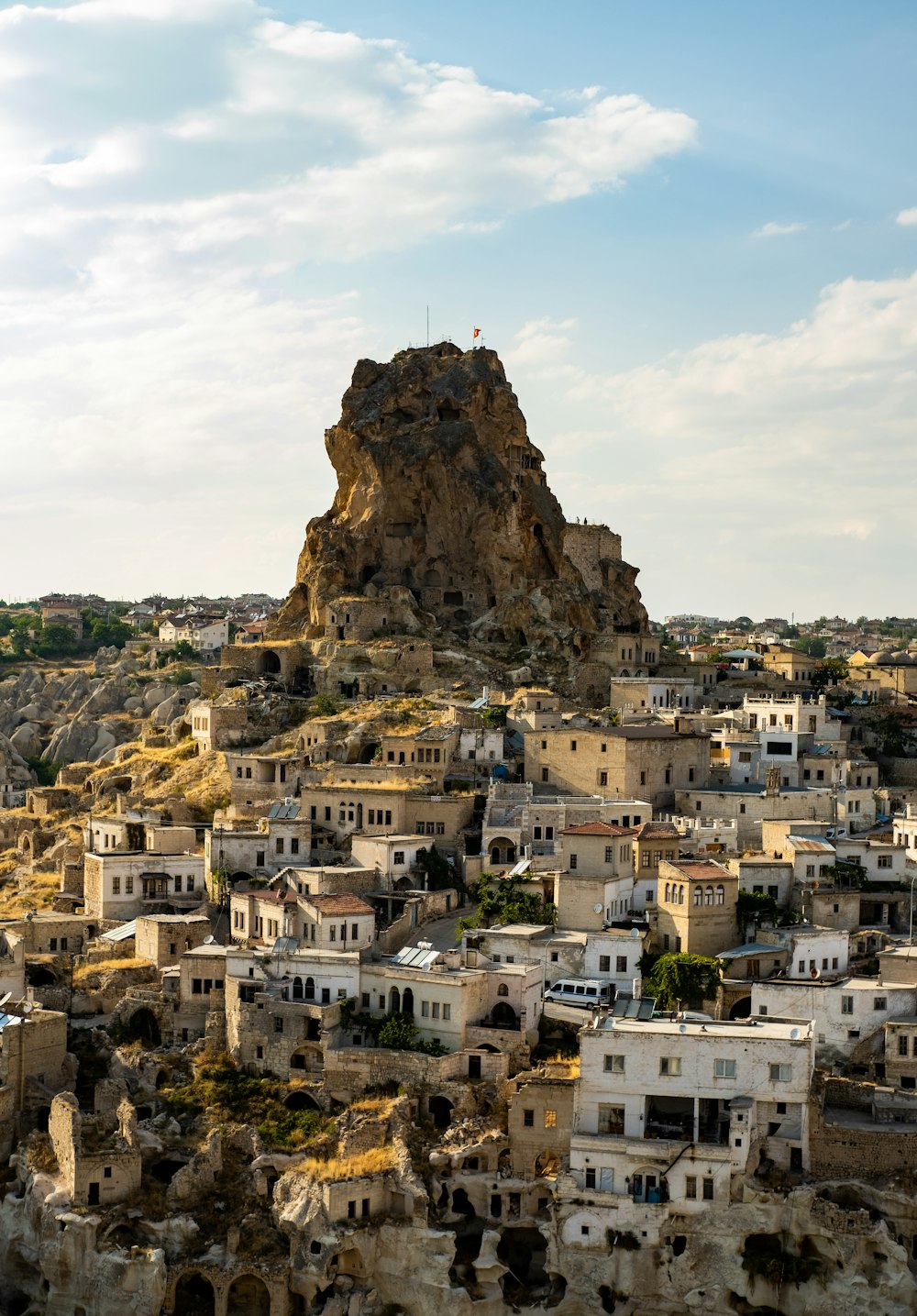 a large rock on top of a city