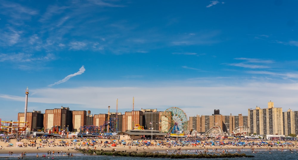 a city skyline with a ferris wheel