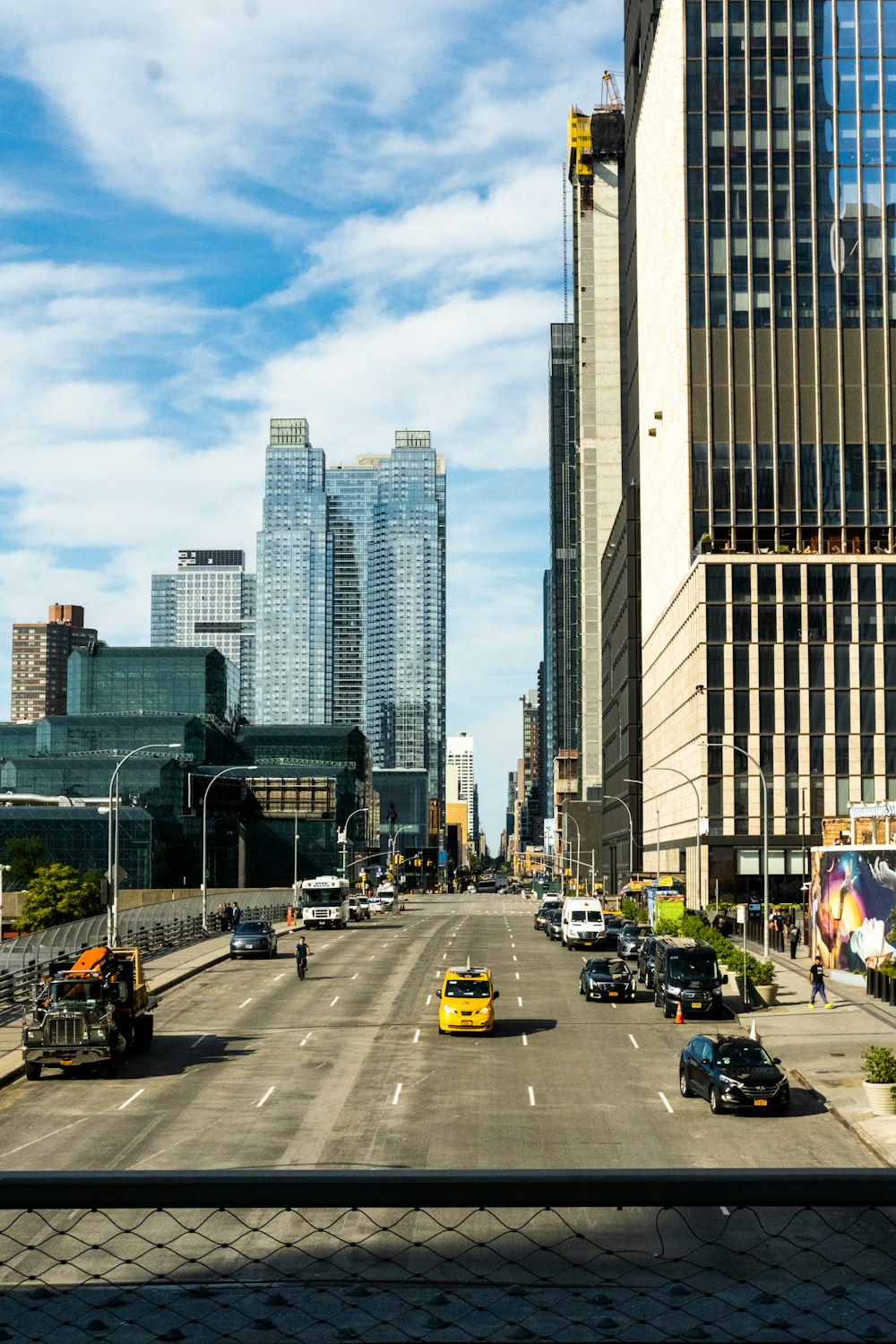 a city street with tall buildings