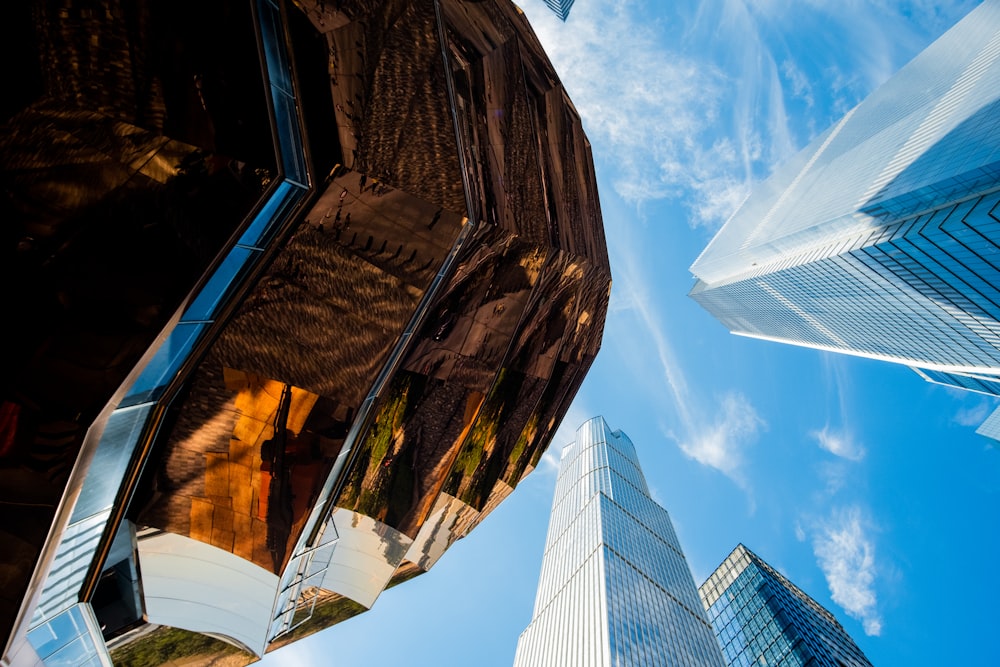 looking up at tall buildings