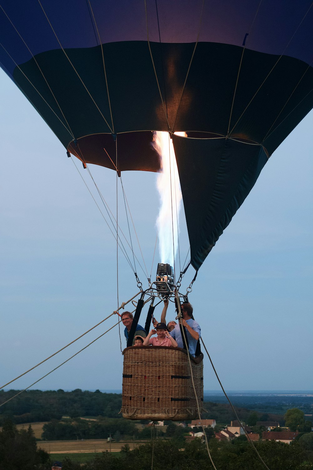 a group of people in a hot air balloon