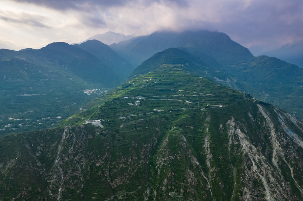 a mountain with a valley below