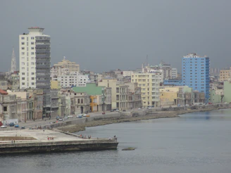 Historic colonial architecture blending with modern buildings along Dakar’s coastline.