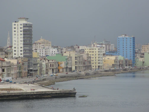 Historic colonial architecture blending with modern buildings along Dakar’s coastline.