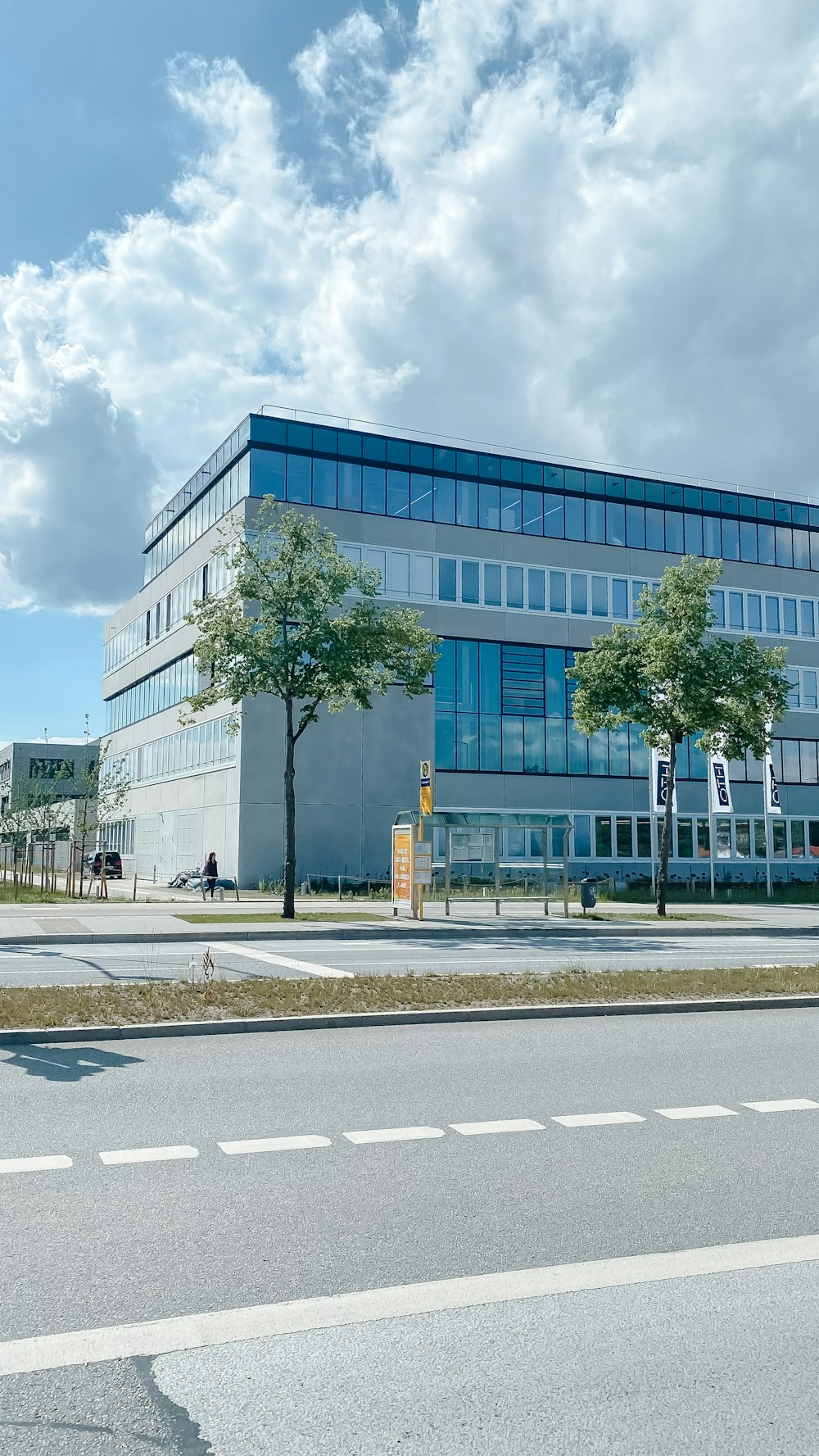 a large building with a parking lot