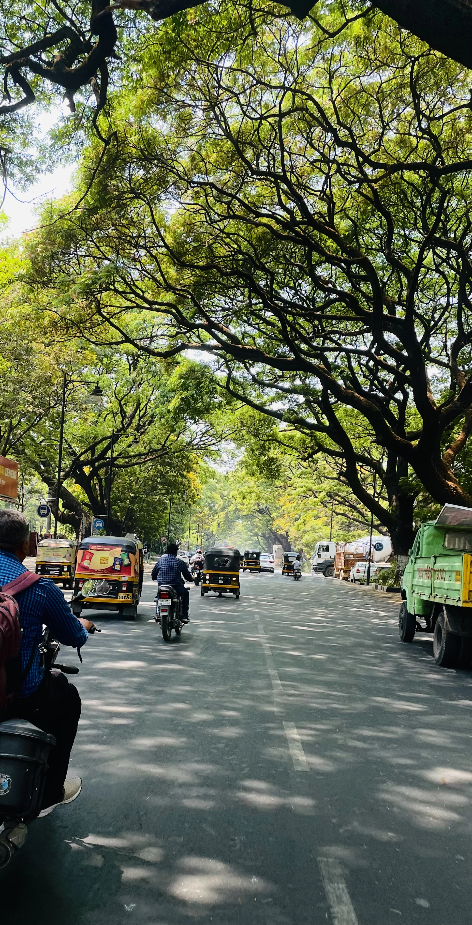 a street with cars and people on it