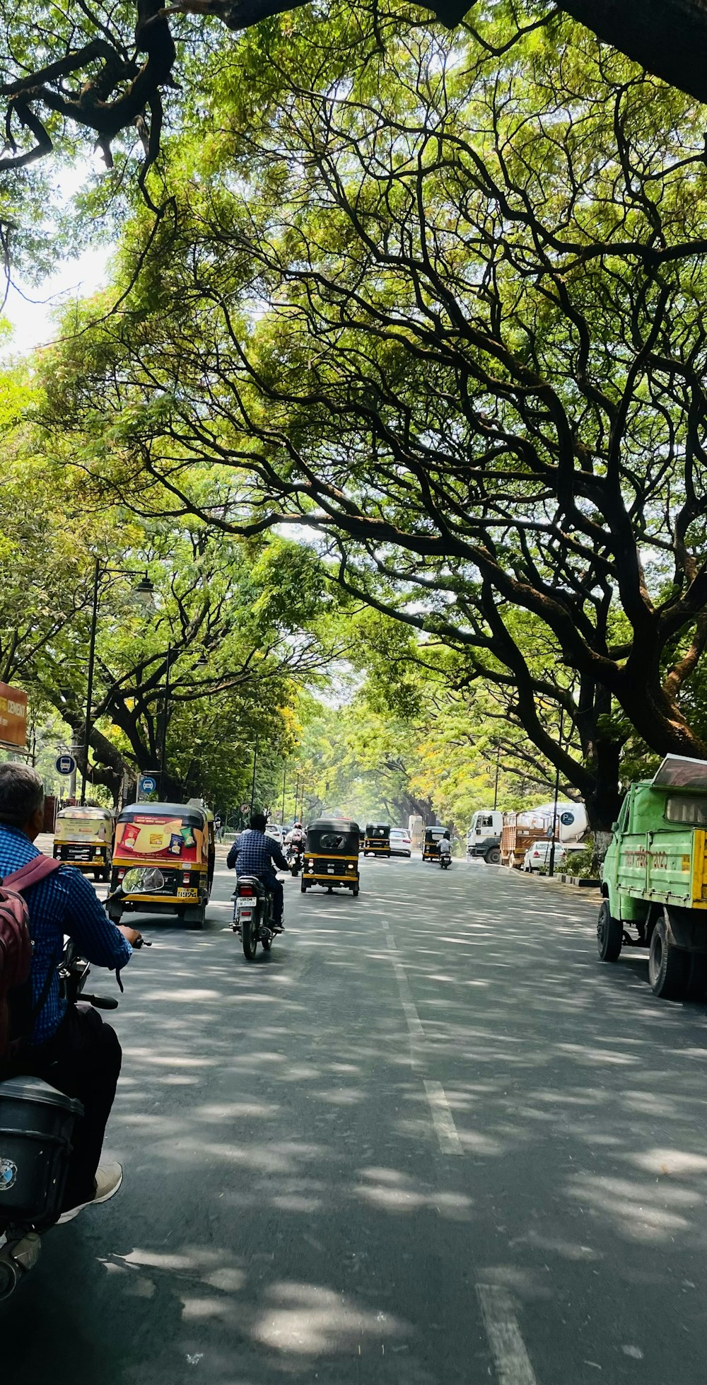 a street with cars and people on it