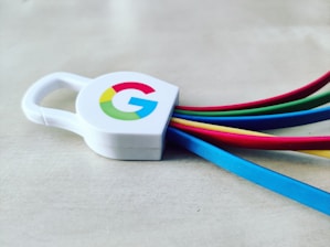 a white and blue cup with a logo on it