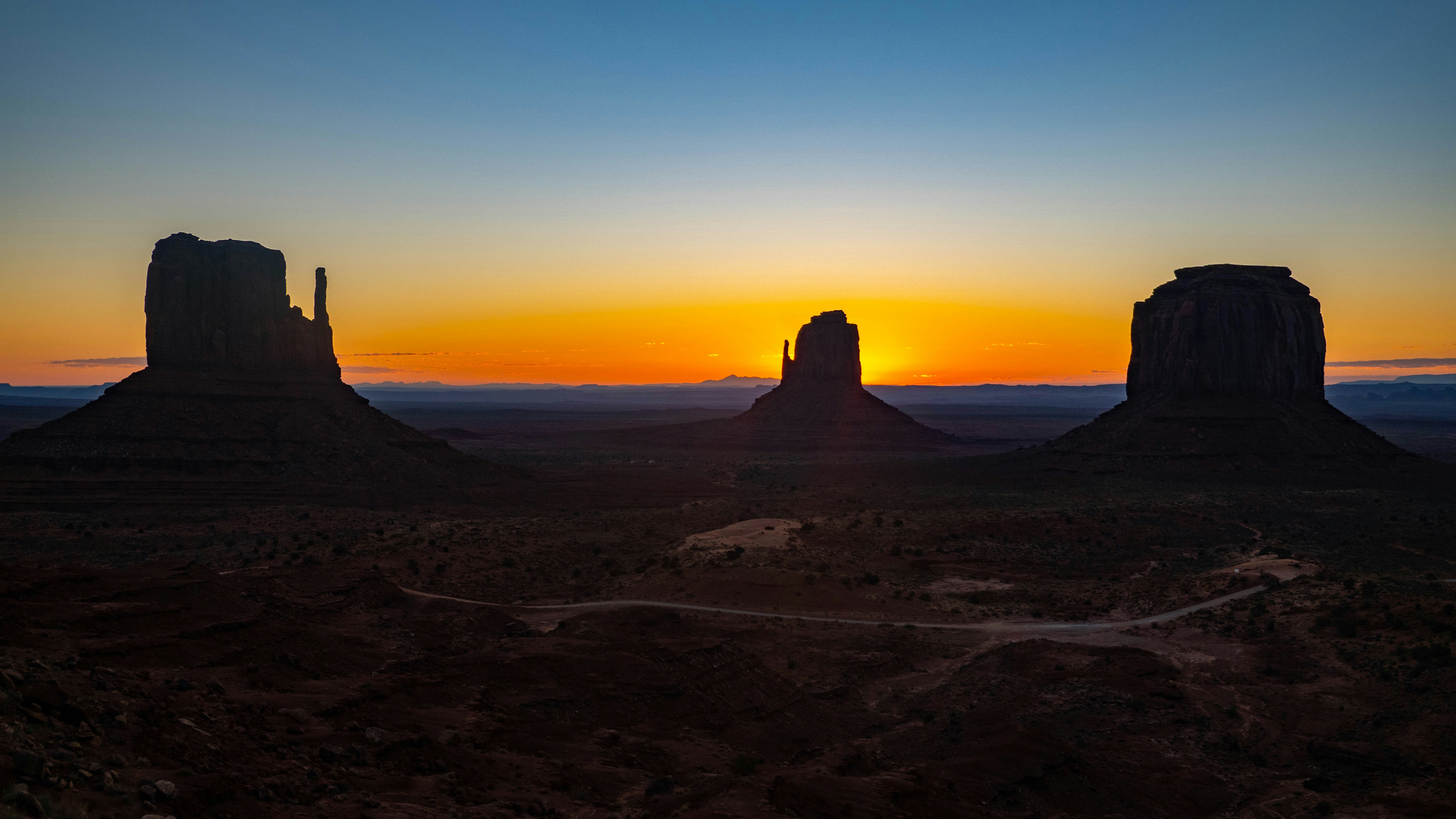 a sunset over a body of water