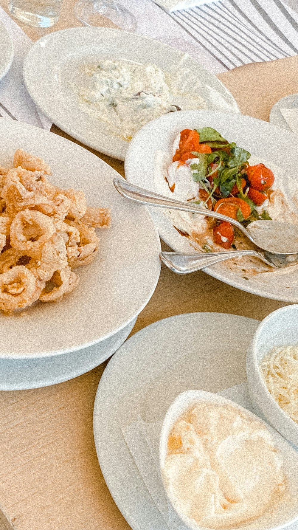 a table full of plates of food