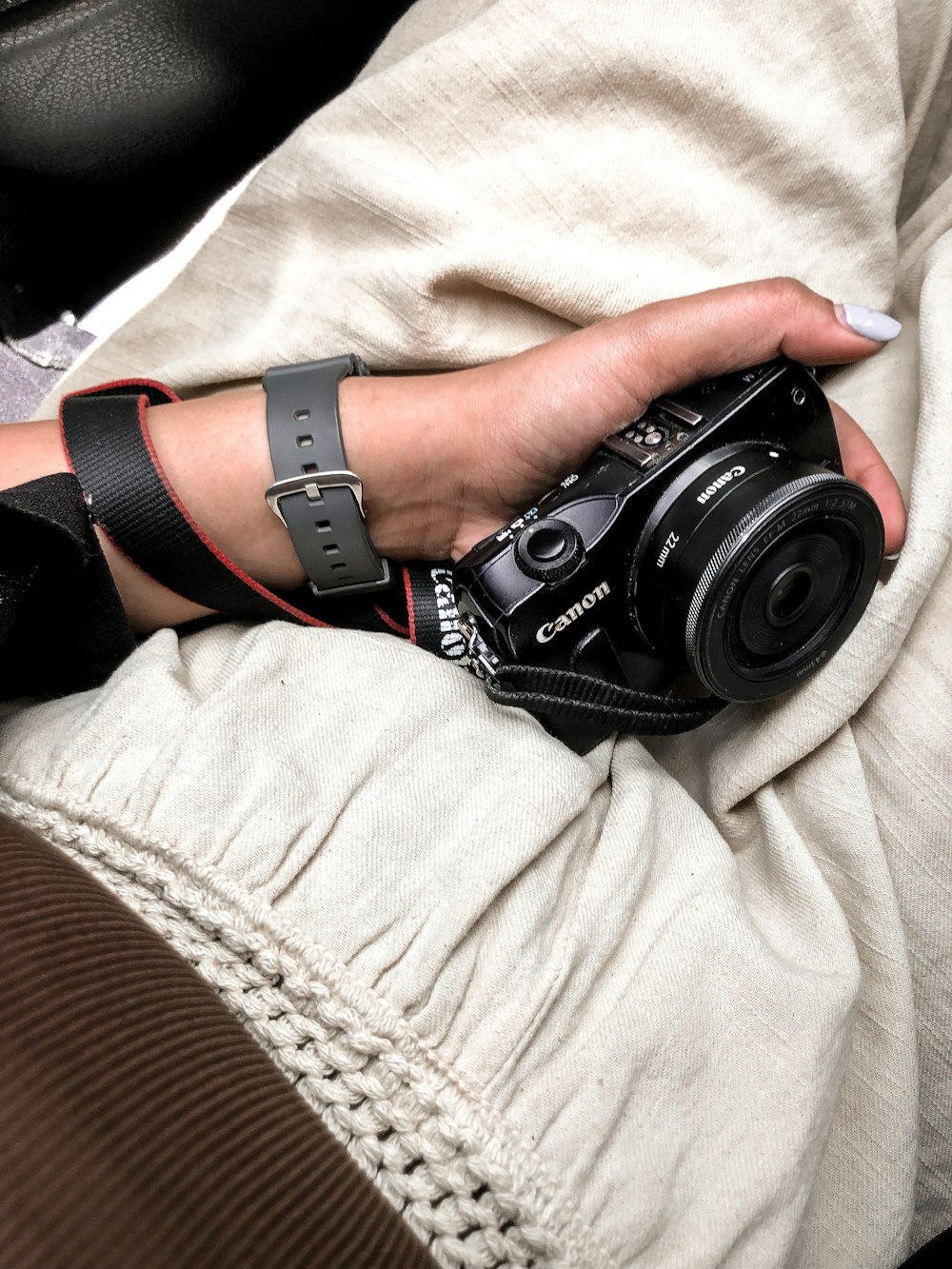 a person holding a camera