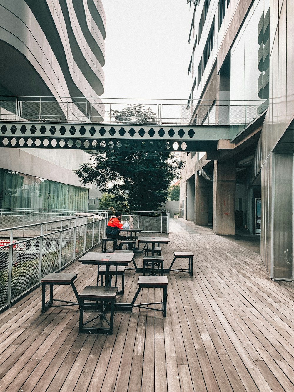 a group of benches sit unoccupied