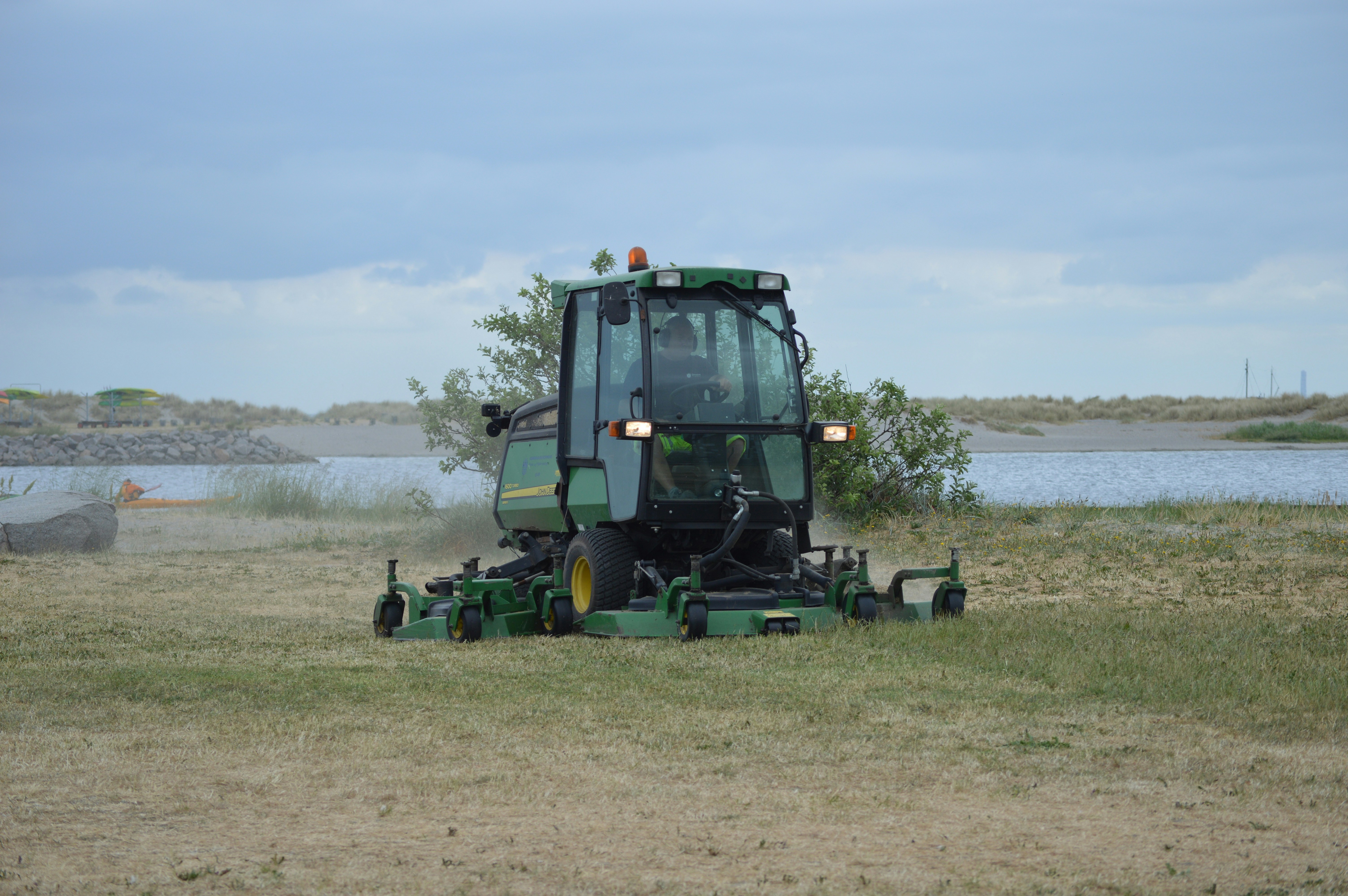 Lawn mower cutting thick grass