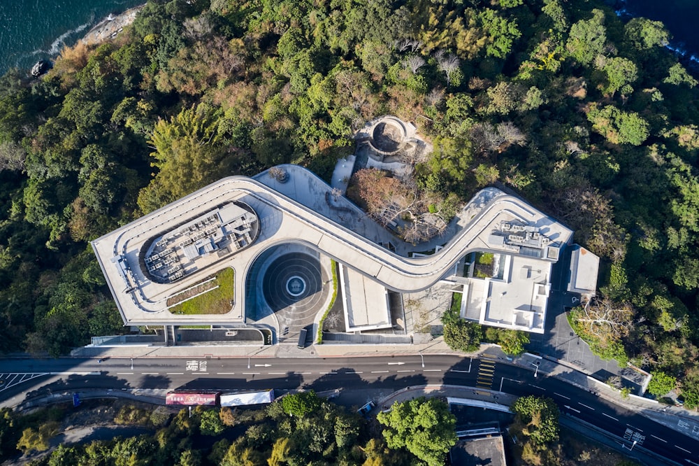 a large building surrounded by trees