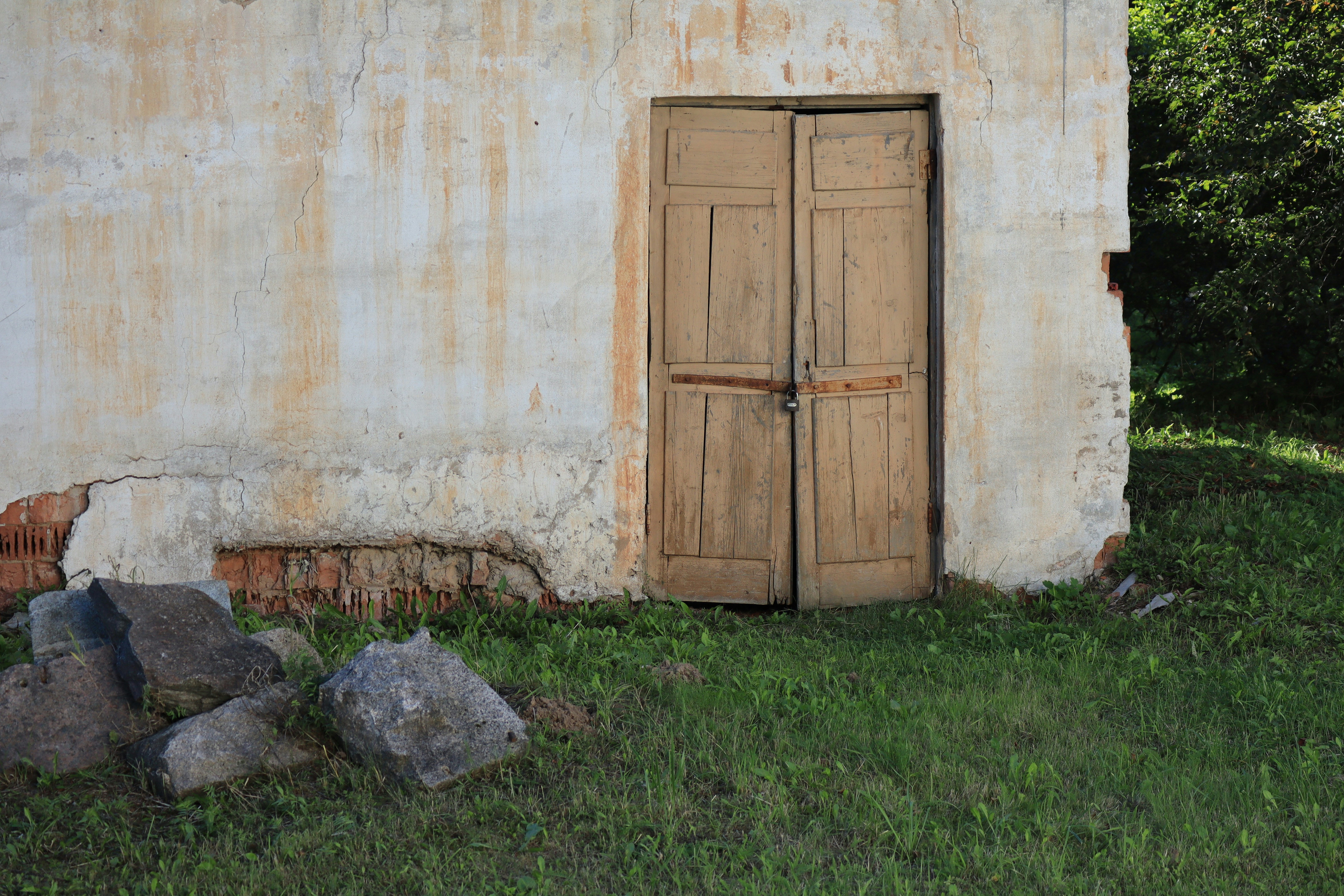 a wooden door on a wall