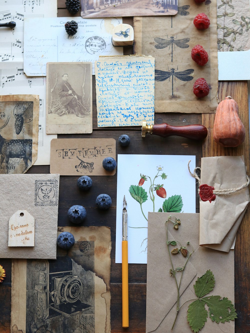 a wall with pictures and fruit