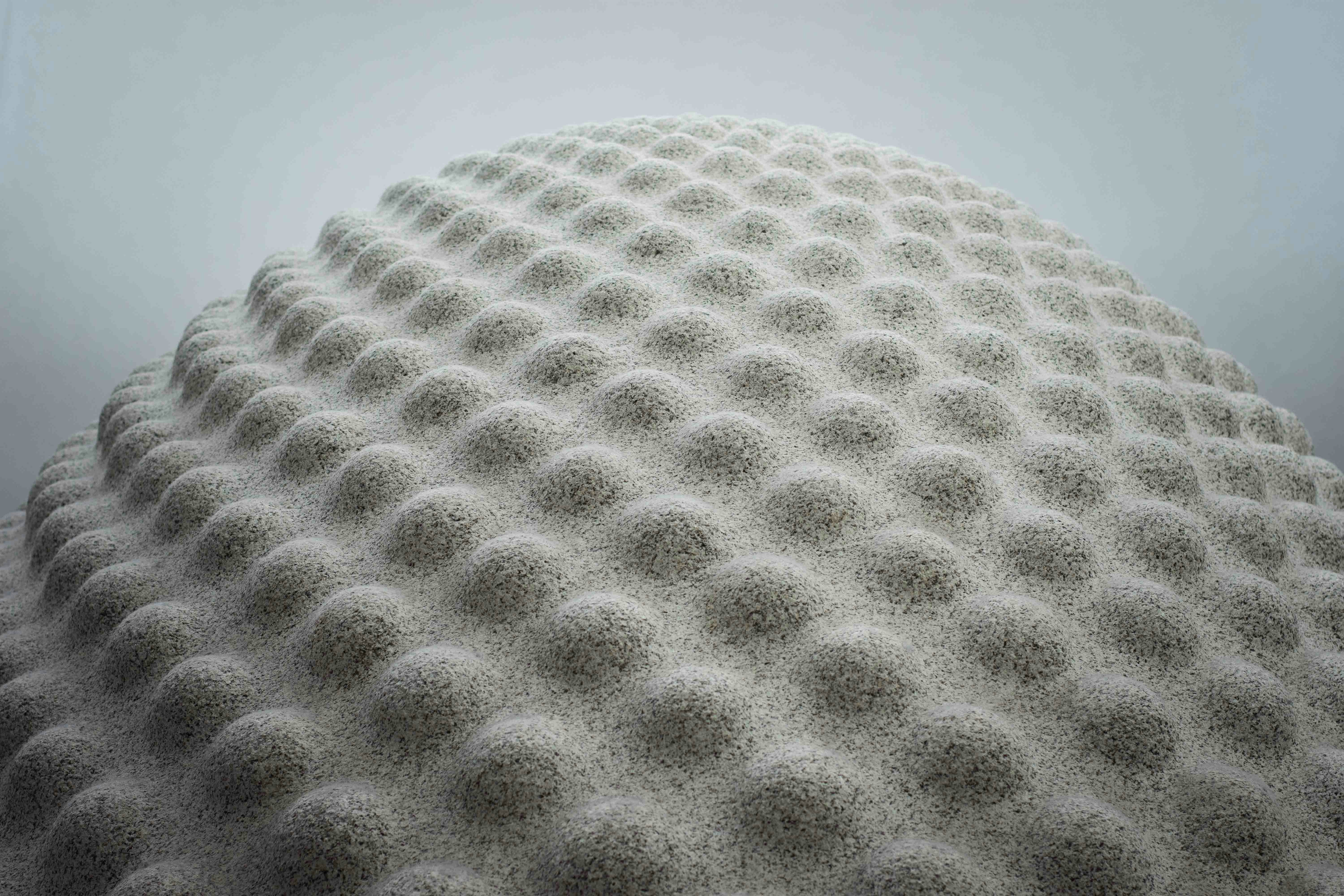 a white object with many small specks on it