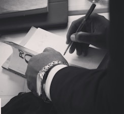 a person with a glove and a gun