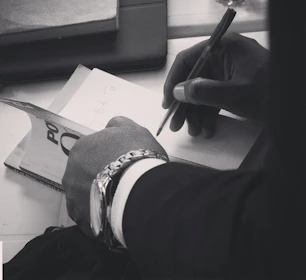 a person with a glove and a gun