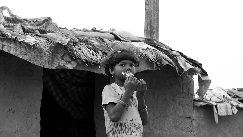 a kid brushing his teeth