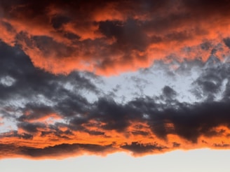 A dramatic sunset over a stormy horizon symbolizing the urgency of end times prophecy.