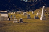 A collection of granite gravestones in various styles.