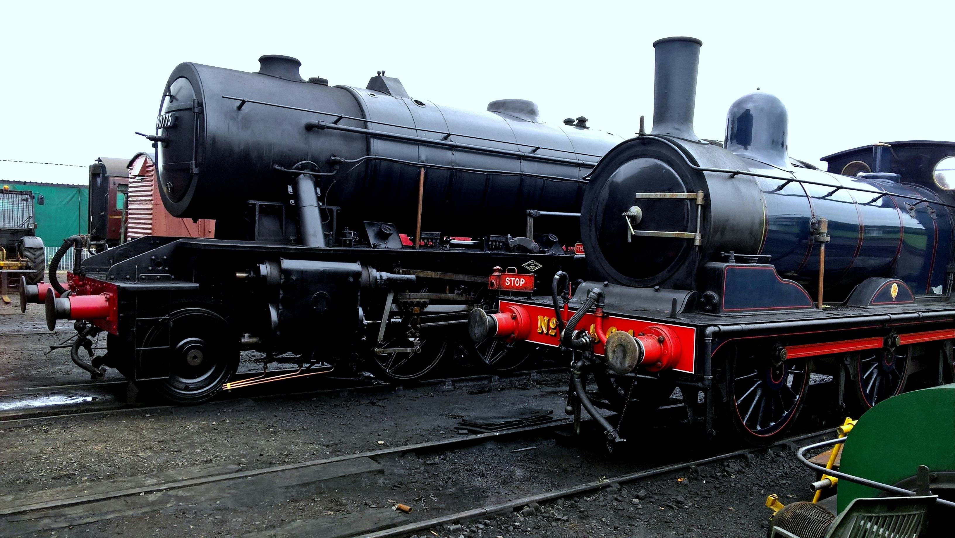 a black train on the tracks, 