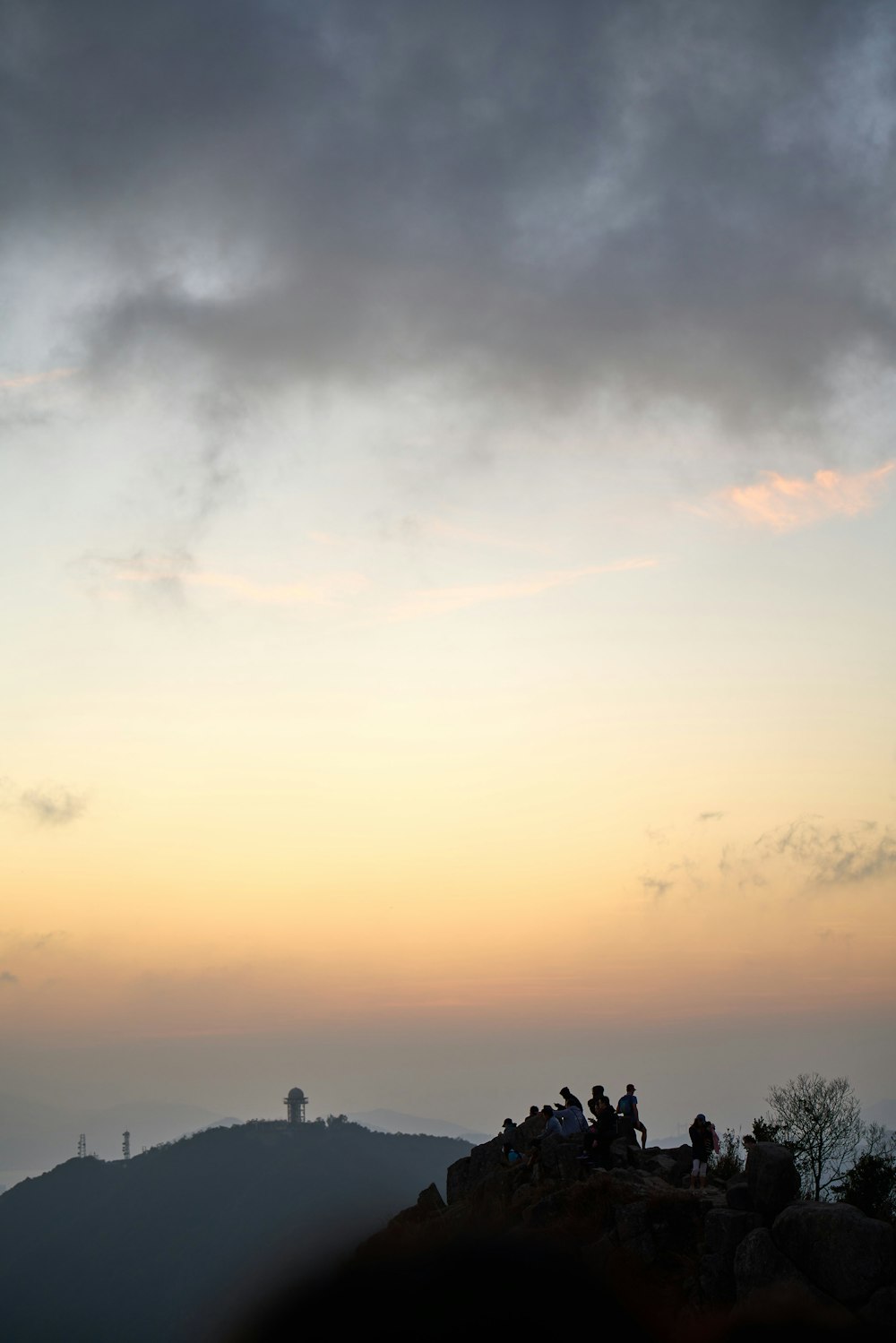 a group of people on a hill