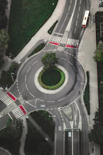 A learner confidently navigating a roundabout near Luton town center.