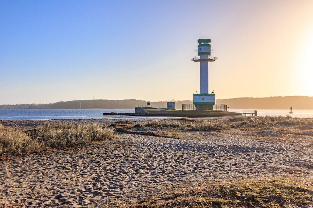 a lighthouse on a beach