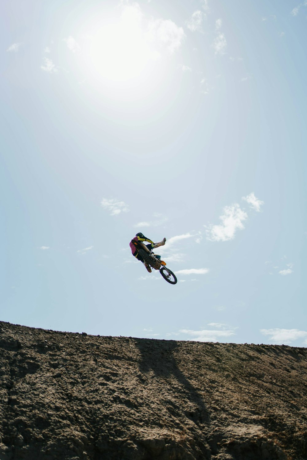 a person jumping a bike