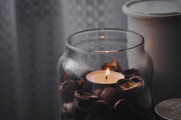 Amber Woods hand-poured soy candle in amber glass jar
