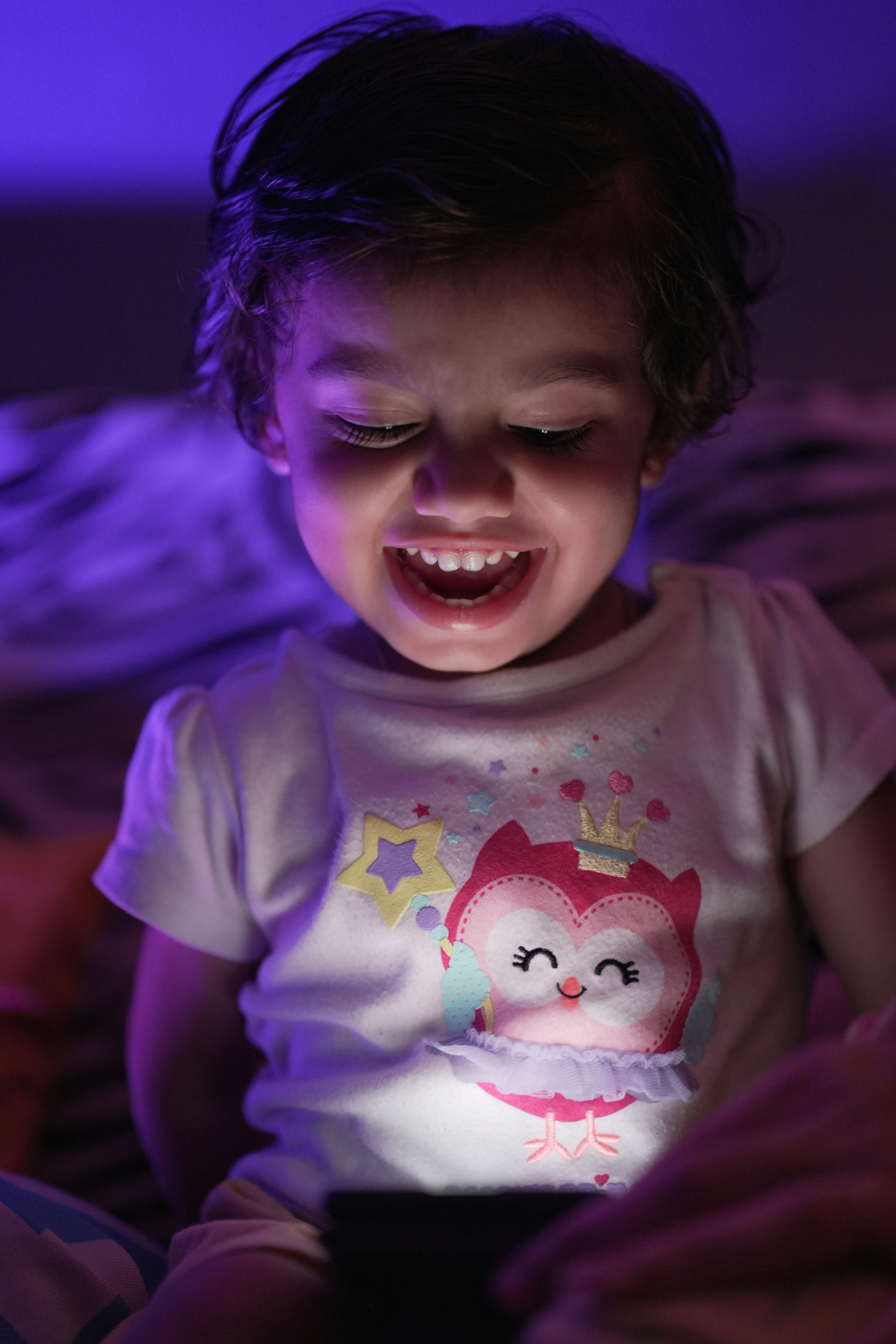 a baby with a pink shirt