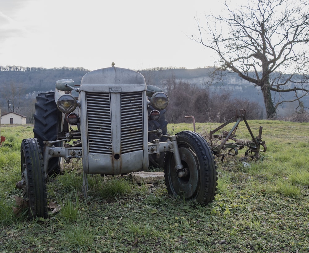 an old tractor in a field