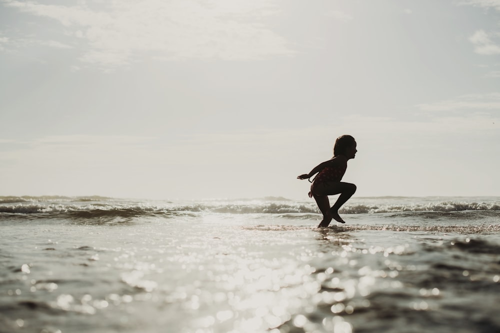 a person walking on the beach