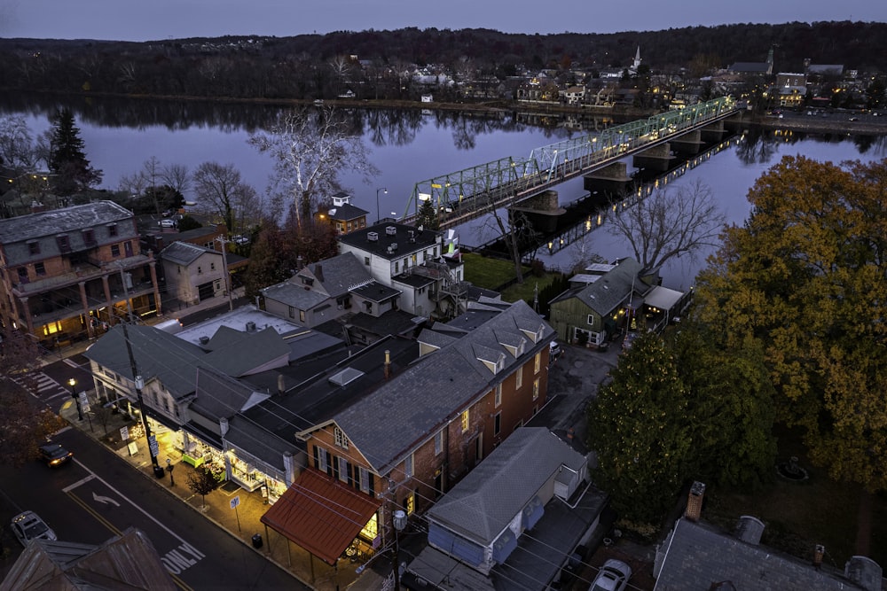 a river with buildings and trees