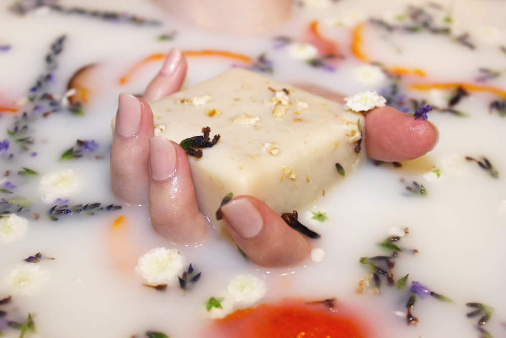 a person's feet on a plate of food