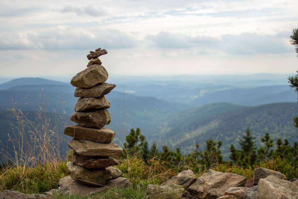 a stack of rocks on a mountain