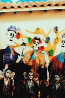 A colorful canvas artwork inspired by Day of the Dead.