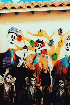 A colorful canvas artwork inspired by Day of the Dead.
