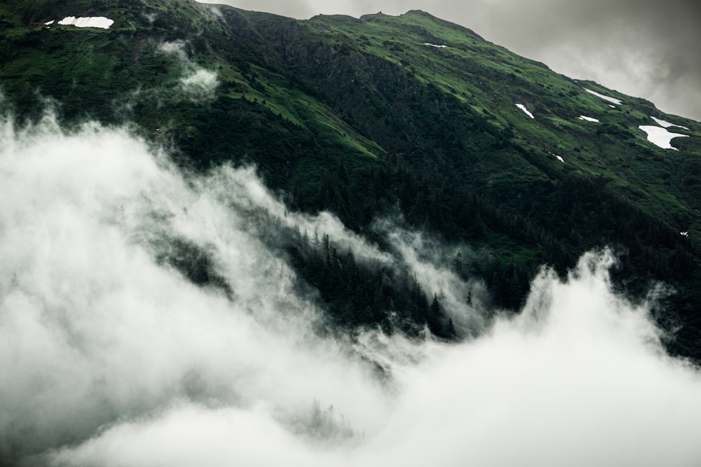 a mountain with clouds