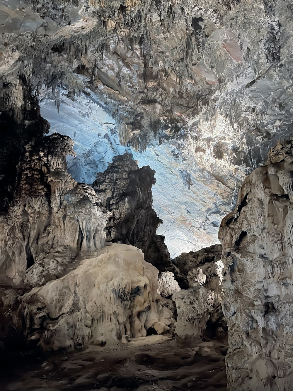 a cave with a waterfall