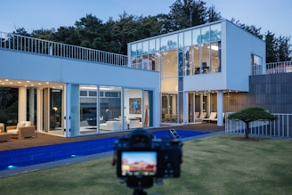 a building with a lawn and a lawn in front of it