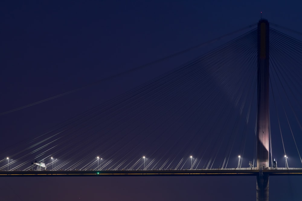 a bridge with lights at night