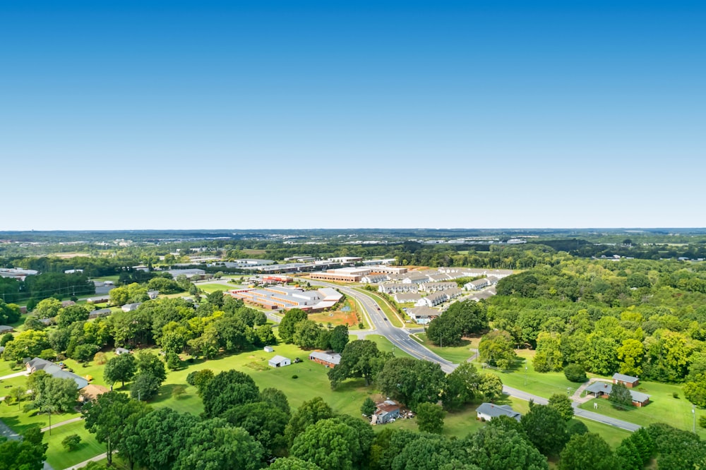 a landscape with trees and buildings