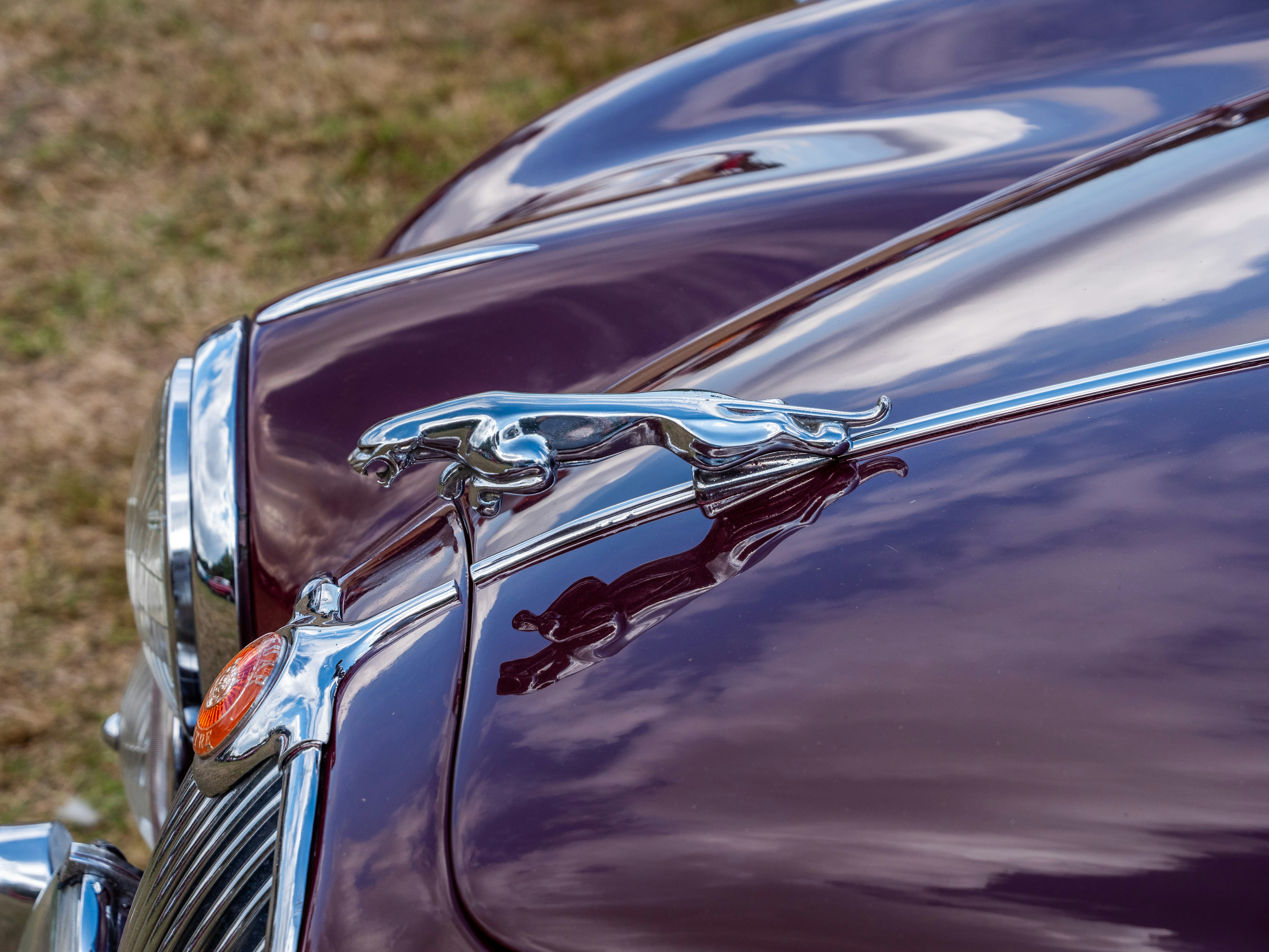 a car with a dent in the front end